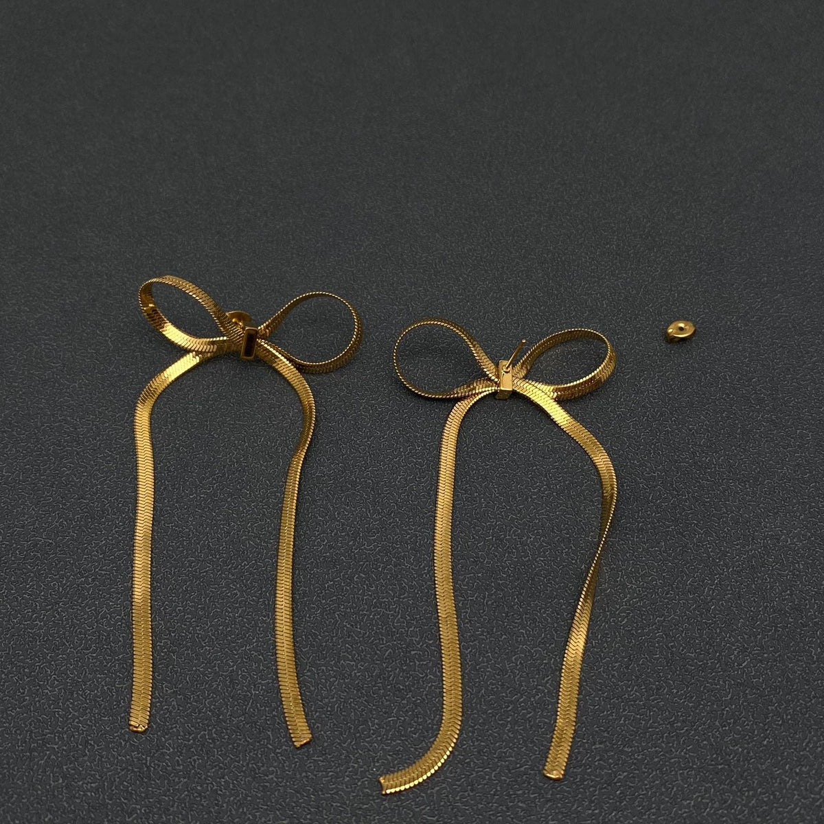 FGS - Chain Fringe Bow 18K Gold Plated SS Earrings: Steel color